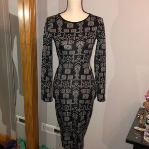 Bodycon knee length dress with‎ Aztec print